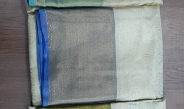 Kaviya 810-B Tan With Blue Colour Tissue Saree CM1439357